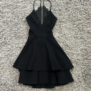 Gorgeous black dress with lace in back. Size small